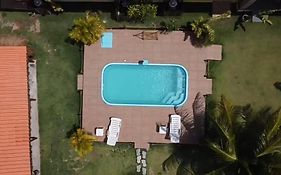 Casa Paraíso amarelo com vista para o farol e o mar